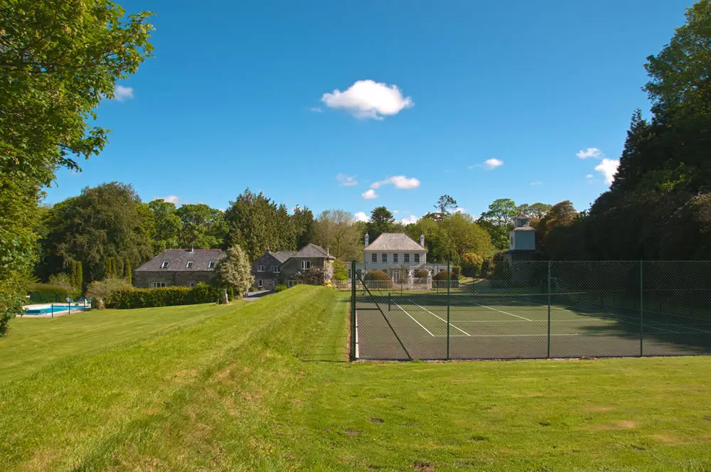 Outdoor Tennis Court at Treworgey Manor Holiday Cottages in Cornwall