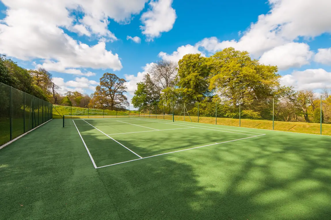 Outdoor Tennis Court at Treworgey Manor Holiday Cottages in Cornwall