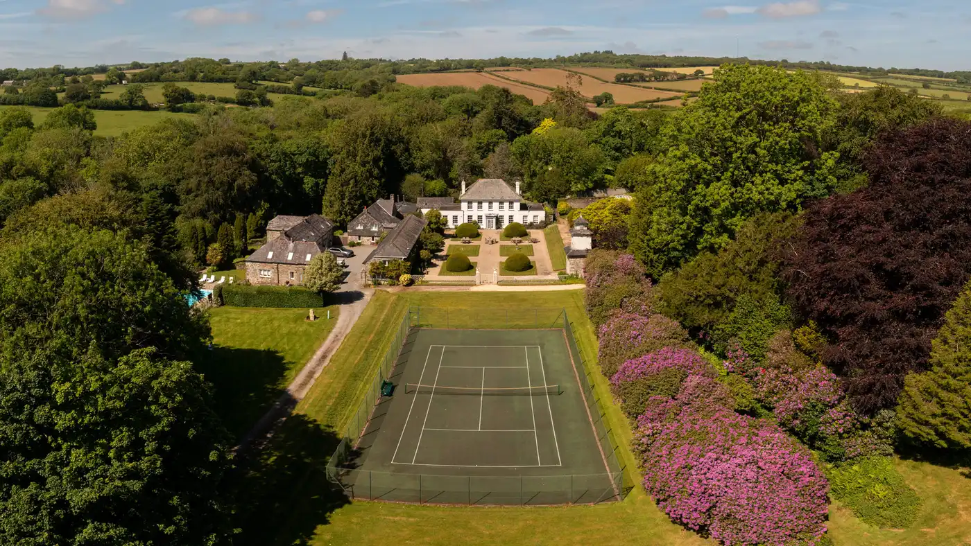 Outdoor Tennis Court at Treworgey Manor Holiday Cottages in Cornwall